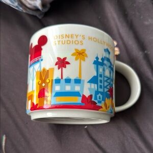 Disney Red and Blue Mug Vibrant Cityscape Design
